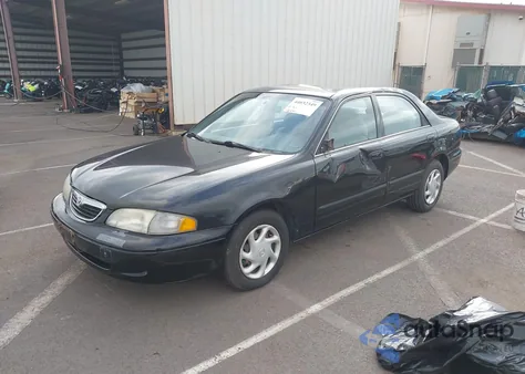 1999 Mazda 626 Es/Lx from USA, damaged, VIN 1YVGF22C6X5854224